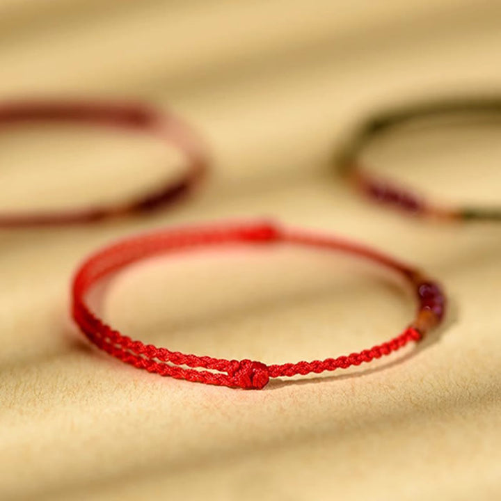 Bracelet de bénédiction en perles de cinabre et bois de pêcher, Buddha Stones