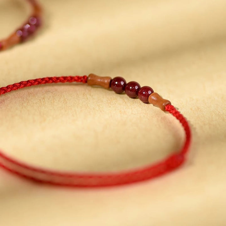 Bracelet de bénédiction en perles de cinabre et bois de pêcher, Buddha Stones