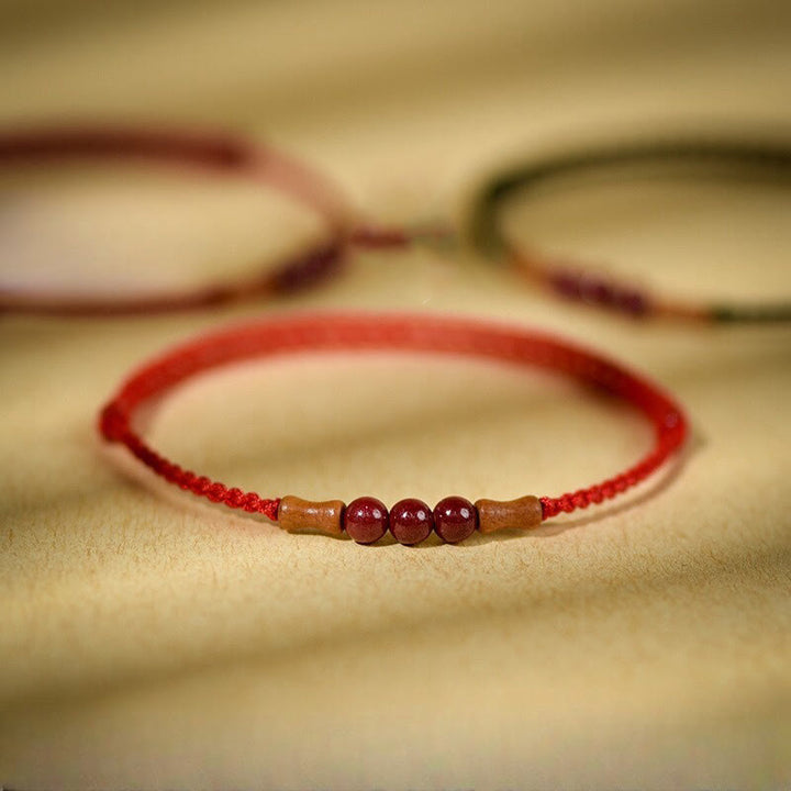Bracelet de bénédiction en perles de cinabre et bois de pêcher, Buddha Stones