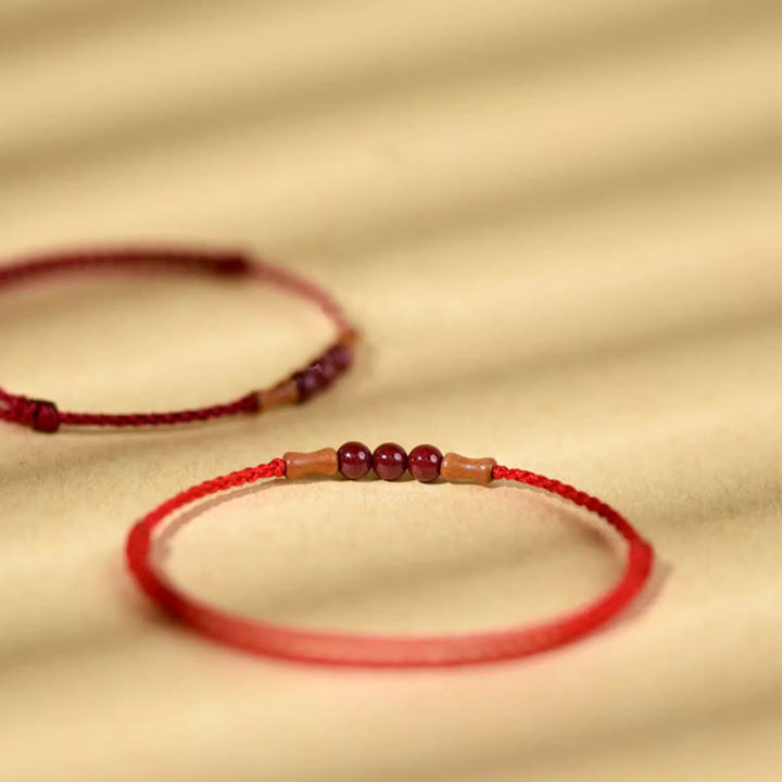 Bracelet de bénédiction en perles de cinabre et bois de pêcher, Buddha Stones