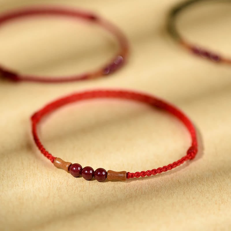 Bracelet de bénédiction en perles de cinabre et bois de pêcher, Buddha Stones