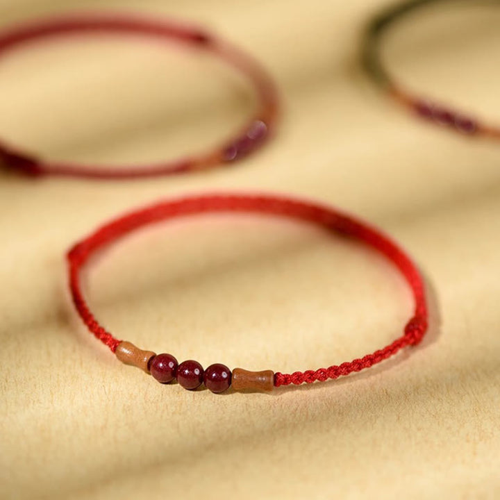 Bracelet de bénédiction en perles de cinabre et bois de pêcher, Buddha Stones