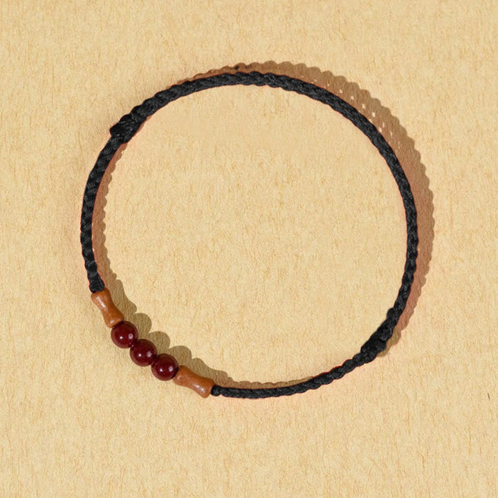 Bracelet de bénédiction en perles de cinabre et bois de pêcher, Buddha Stones