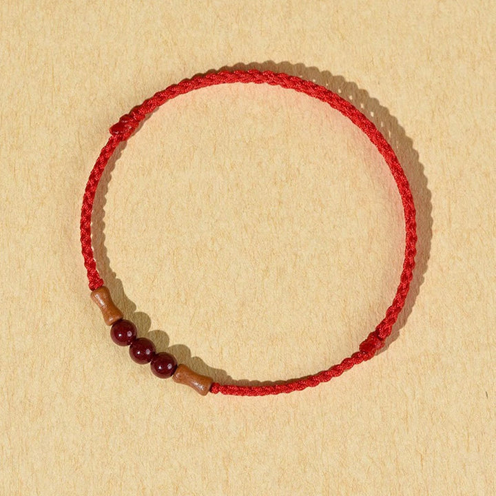Bracelet de bénédiction en perles de cinabre et bois de pêcher, Buddha Stones