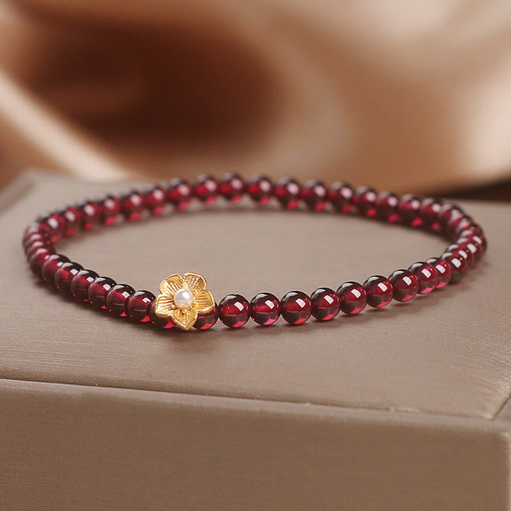 Bracelet Buddha Stones Perles de grenat naturel 4 mm Fleur Passion