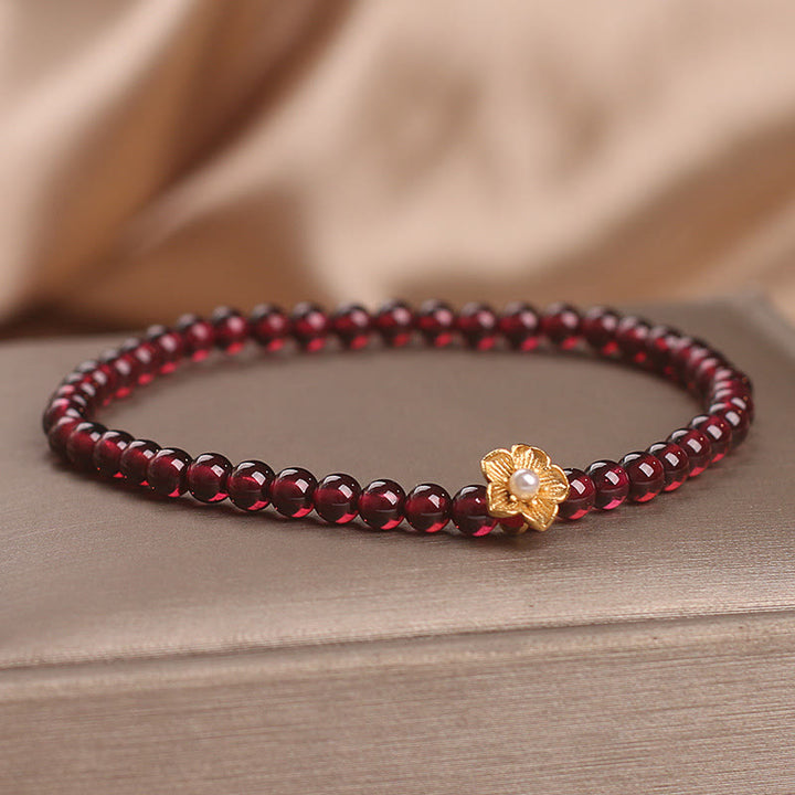 Bracelet Buddha Stones Perles de grenat naturel 4 mm Fleur Passion