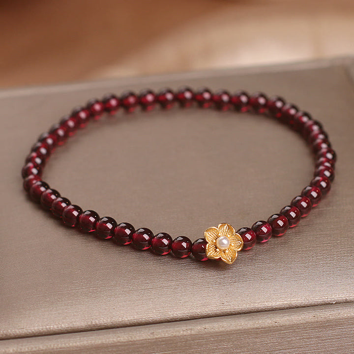 Bracelet Buddha Stones Perles de grenat naturel 4 mm Fleur Passion