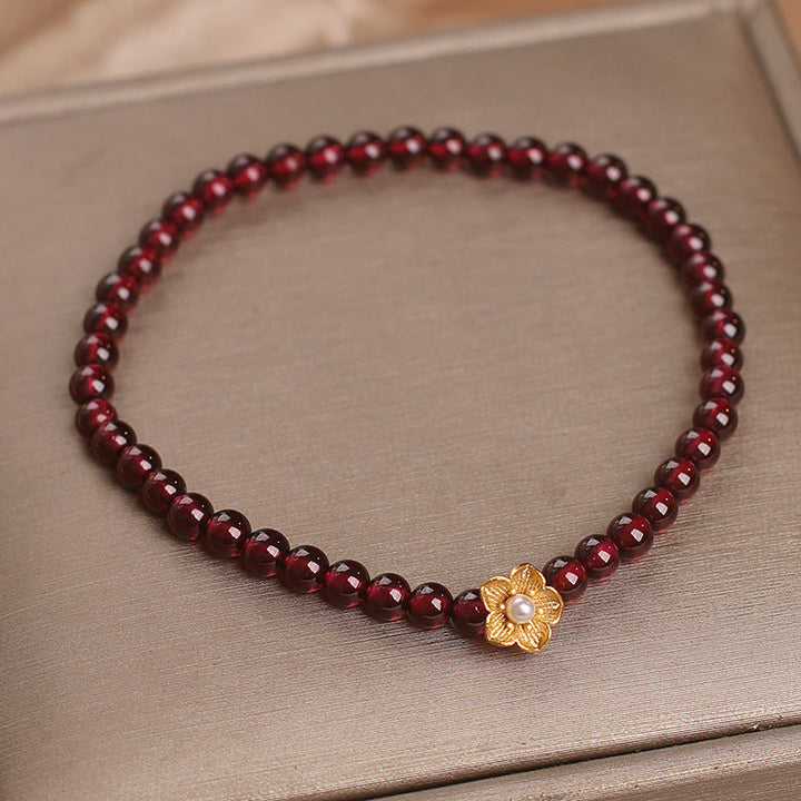 Bracelet Buddha Stones Perles de grenat naturel 4 mm Fleur Passion