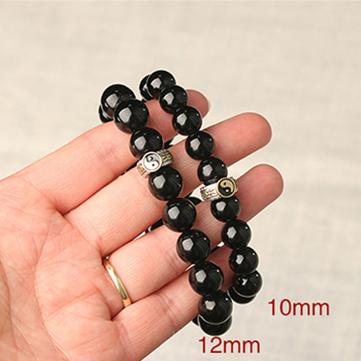 Bracelet d'accomplissement du mantra Yin Yang à neuf caractères en obsidienne noire et Buddha Stones