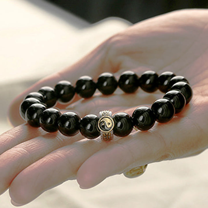 Bracelet d'accomplissement du mantra Yin Yang à neuf caractères en obsidienne noire et Buddha Stones