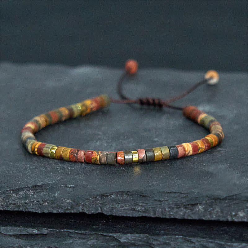 Bracelet de perles d'espacement en rhodonite et Buddha Stones pour la guérison des relations