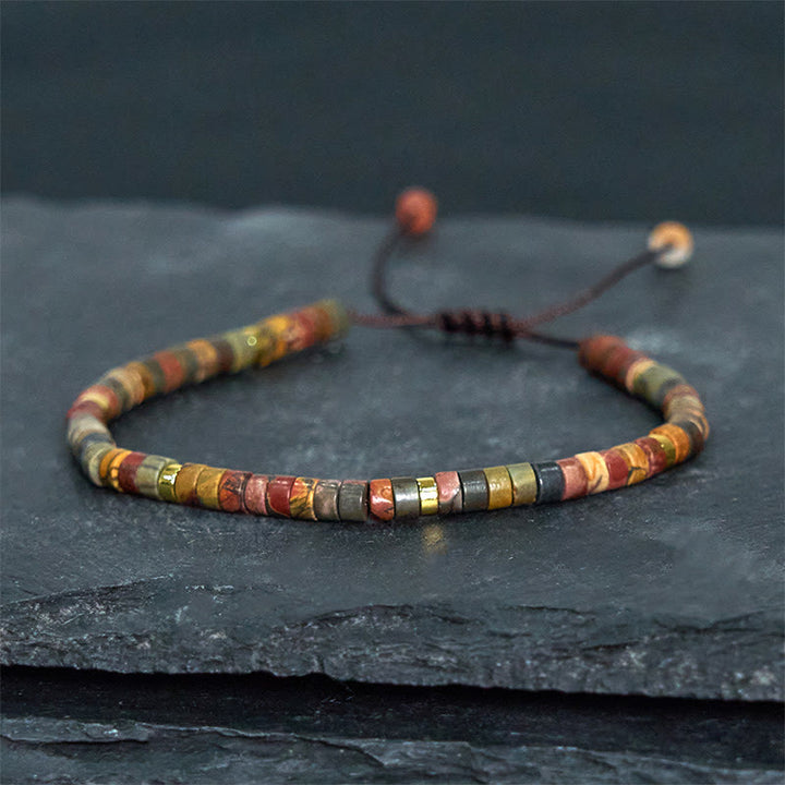 Bracelet de perles d'espacement en rhodonite et Buddha Stones pour la guérison des relations