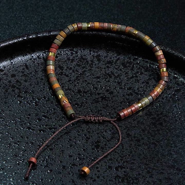 Bracelet de perles d'espacement en rhodonite et Buddha Stones pour la guérison des relations
