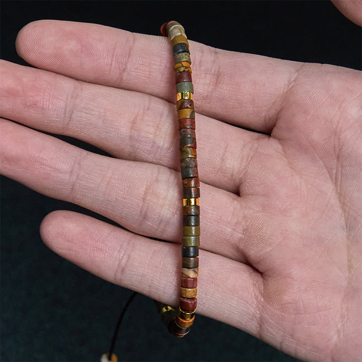 Bracelet de perles d'espacement en rhodonite et Buddha Stones pour la guérison des relations