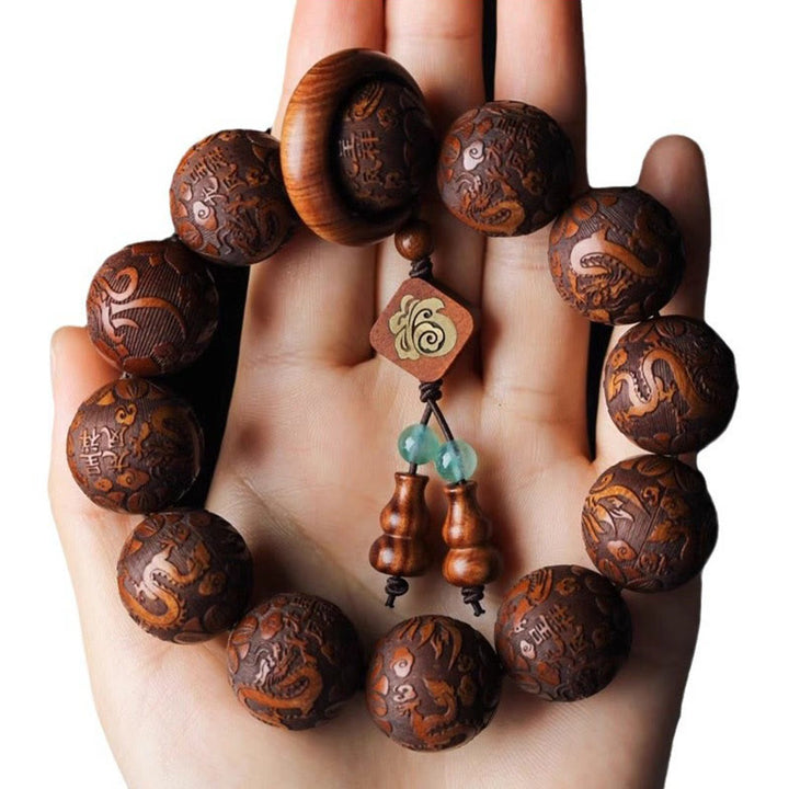 Bracelet de chaleur en perles de bois de rose avec Buddha Stones sculptées naturelles, dragon et phénix Fu