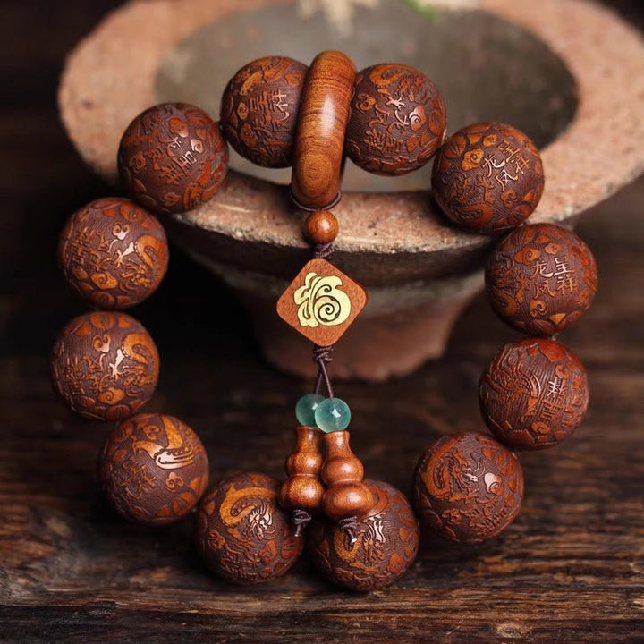 Bracelet de chaleur en perles de bois de rose avec Buddha Stones sculptées naturelles, dragon et phénix Fu