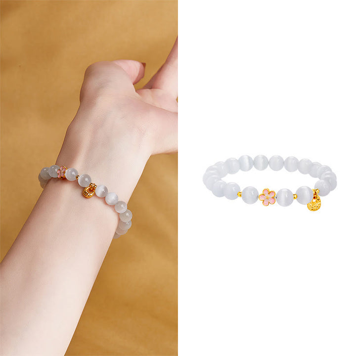 Bracelet œil de chat blanc en argent sterling 925 avec Buddha Stones et fleur de pêcher naturelle