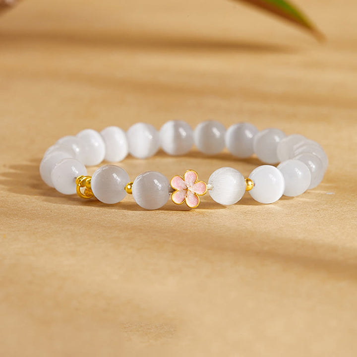 Bracelet œil de chat blanc en argent sterling 925 avec Buddha Stones et fleur de pêcher naturelle