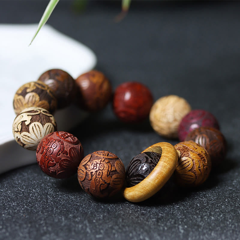 Bracelet de guérison en bois de santal sculpté avec Buddha Stones et symbole du zodiaque chinois, dragon, phénix, caractère Fu