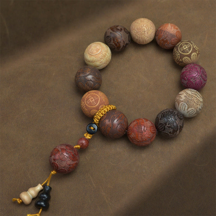 Bracelet de guérison en bois de santal sculpté avec Buddha Stones et symbole du zodiaque chinois, dragon, phénix, caractère Fu