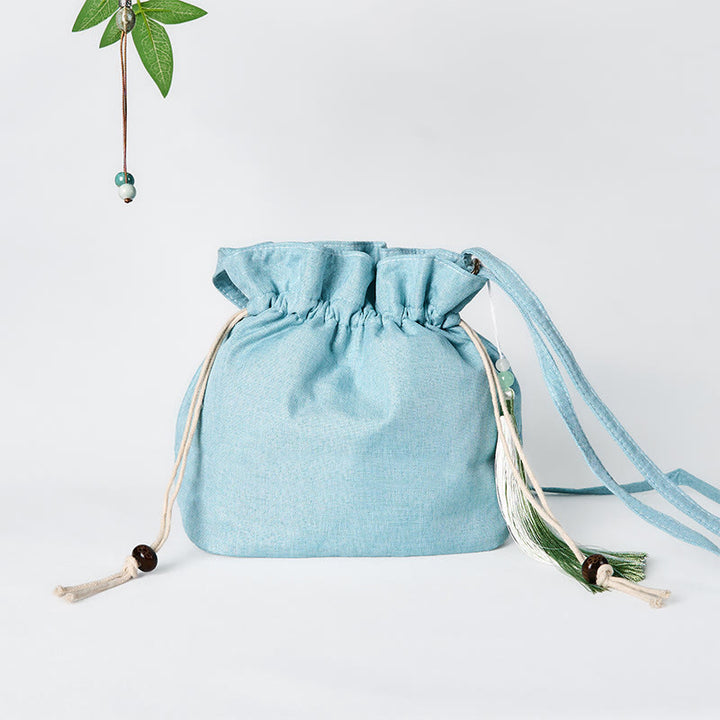 Sac à bandoulière en coton et lin de bambou vert brodé de Buddha Stones