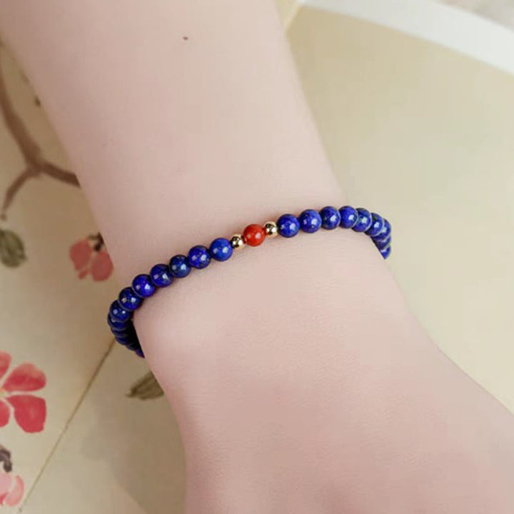 Bracelet positif en perles ultra-fines de lazurite, lapis-lazuli et cinabre, composé de petites Buddha Stones de positivité - image 3