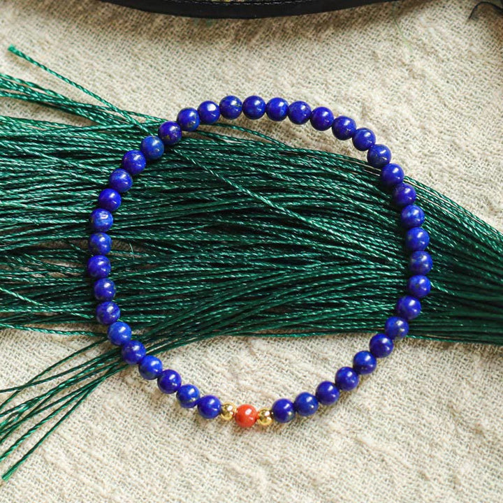 Bracelet positif en perles ultra-fines de lazurite, lapis-lazuli et cinabre, composé de petites Buddha Stones de positivité - image 2