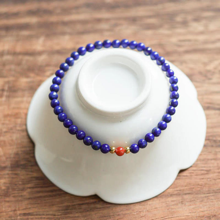 Bracelet positif en perles ultra-fines de lazurite, lapis-lazuli et cinabre, composé de petites Buddha Stones de positivité - image 0