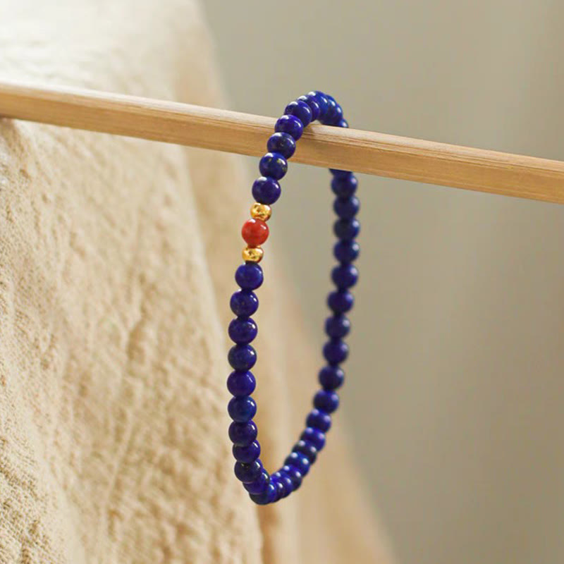 Bracelet positif en perles ultra-fines de lazurite, lapis-lazuli et cinabre, composé de petites Buddha Stones de positivité - image 1