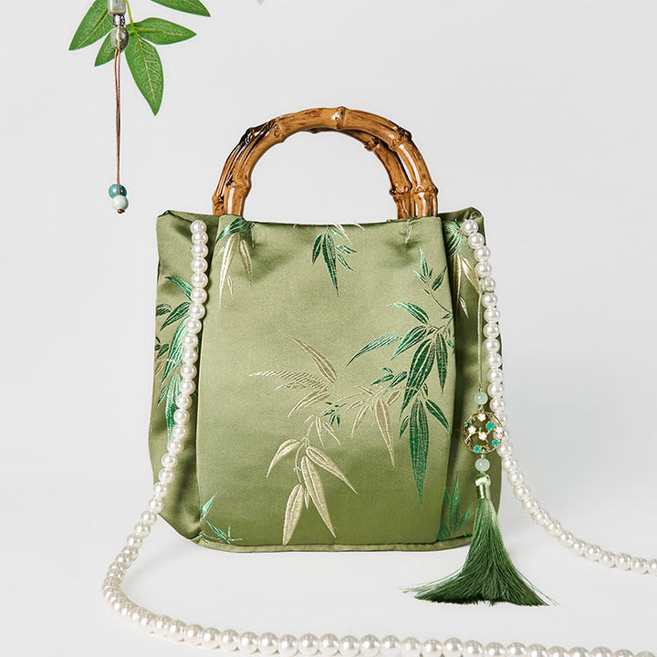 Sac à bandoulière avec broderies de Buddha Stones , poignée en bambou et perles
