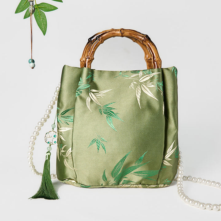 Sac à bandoulière avec broderies de Buddha Stones , poignée en bambou et perles