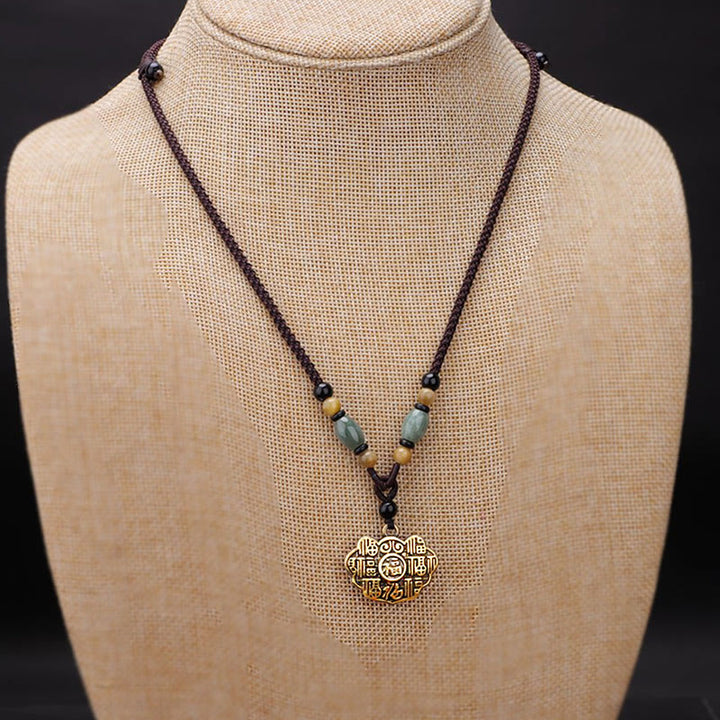 Buddha Stones Collier pendentif en laiton et cuivre, symbole de chance et de fortune, avec le caractère Fu et la corde. - image 1