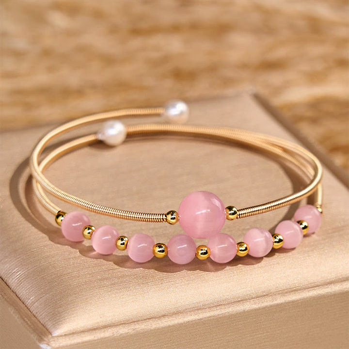 Bracelet manchette en métal avec œil de chat rose en cuivre rempli d'or 14 carats et Buddha Stones