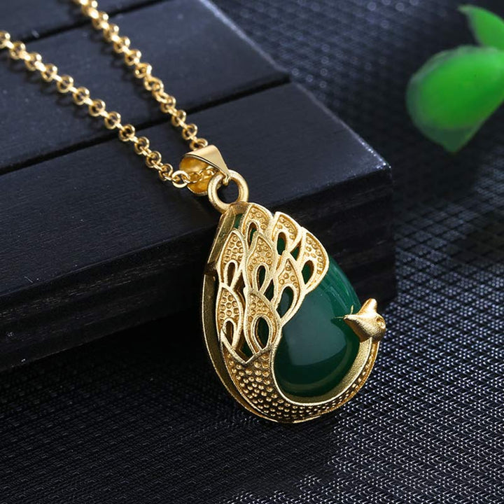 Collier pendentif en cuivre et calcédoine verte et cristal rose avec pendentif apaisant