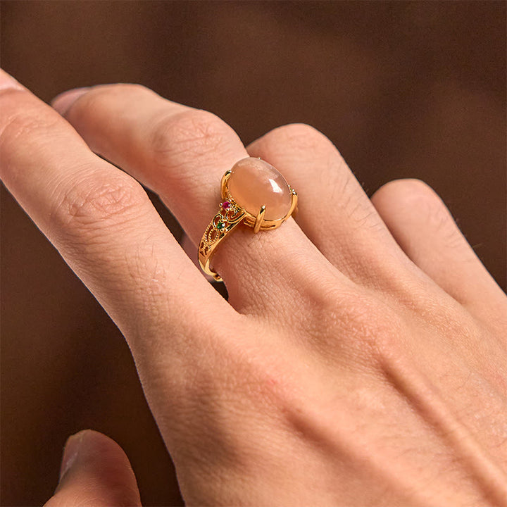 Bague porte-bonheur ajustable en pierre de lune pêche avec motif de vigne creuse et Buddha Stones