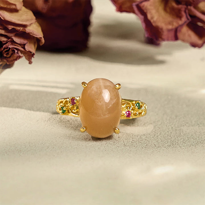 Bague porte-bonheur ajustable en pierre de lune pêche avec motif de vigne creuse et Buddha Stones