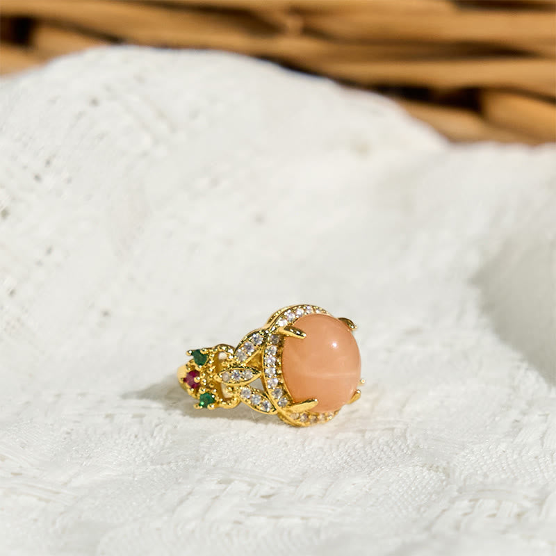 Bague ajustable en pierre de lune pêche, sertie de Buddha Stones