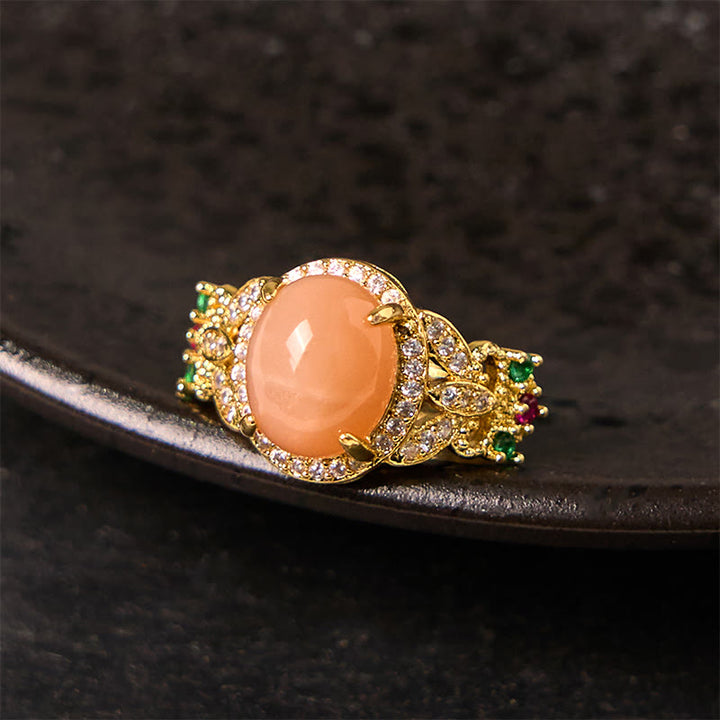 Bague ajustable en pierre de lune pêche, sertie de Buddha Stones