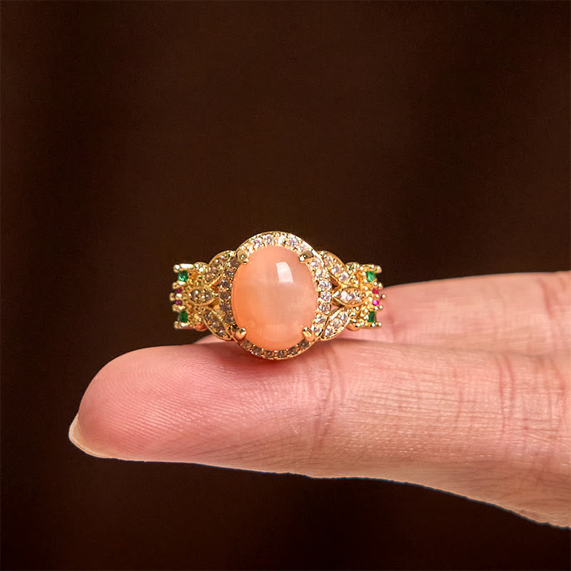 Bague ajustable en pierre de lune pêche, sertie de Buddha Stones