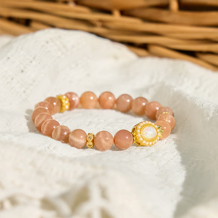 Bracelet apaisant réglable en pierre de lune pêche naturelle Buddha Stones