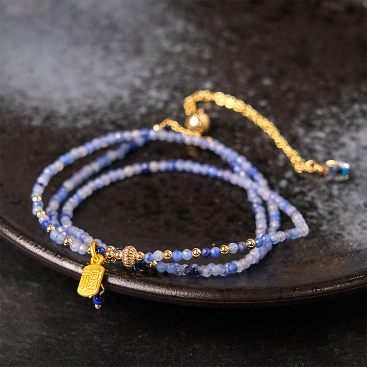 Bracelet triple tour en perles ultra-fines de 3 mm en lazurite naturelle (lapis-lazuli) avec symbole Fu positif - Lazurite 3 mm (Tour de poignet : 14-15 cm) - image 0