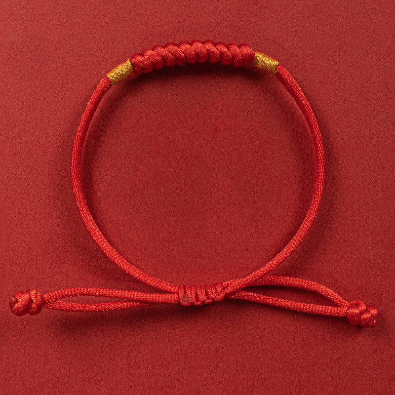 Bracelet en corde rouge tressée à la main avec nœud plat et Buddha Stones