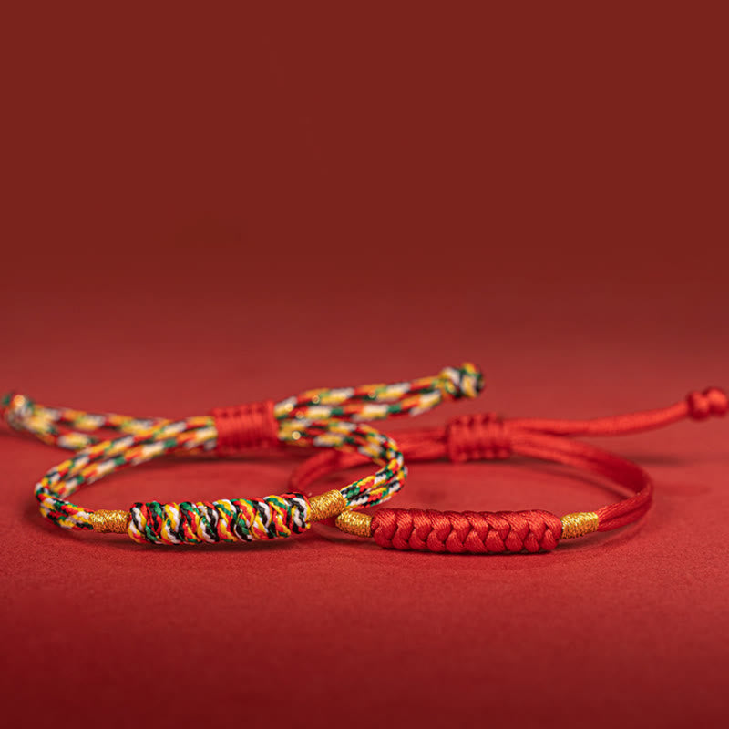 Bracelet en corde rouge tressée à la main avec nœud plat et Buddha Stones