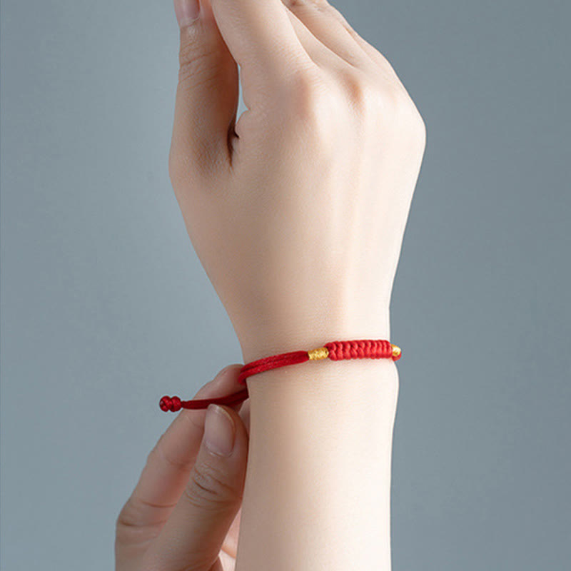 Bracelet en corde rouge tressée à la main avec nœud plat et Buddha Stones