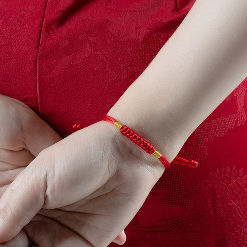 Bracelet en corde rouge tressée à la main avec nœud plat et Buddha Stones
