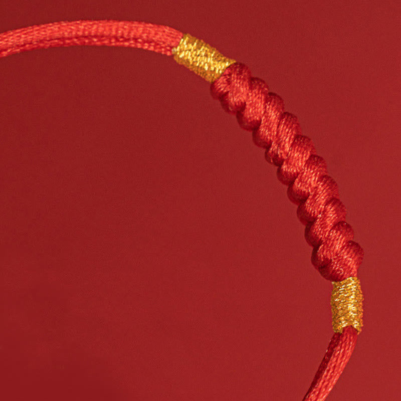 Bracelet en corde rouge tressée à la main avec nœud plat et Buddha Stones