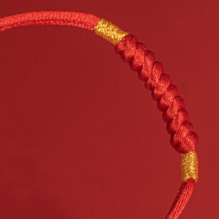 Bracelet en corde rouge tressée à la main avec nœud plat et Buddha Stones