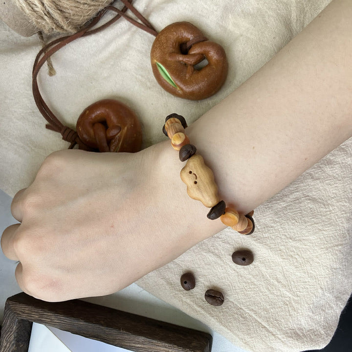 Bracelet de protection en bois de santal et grains de café, Buddha Stones - image 3