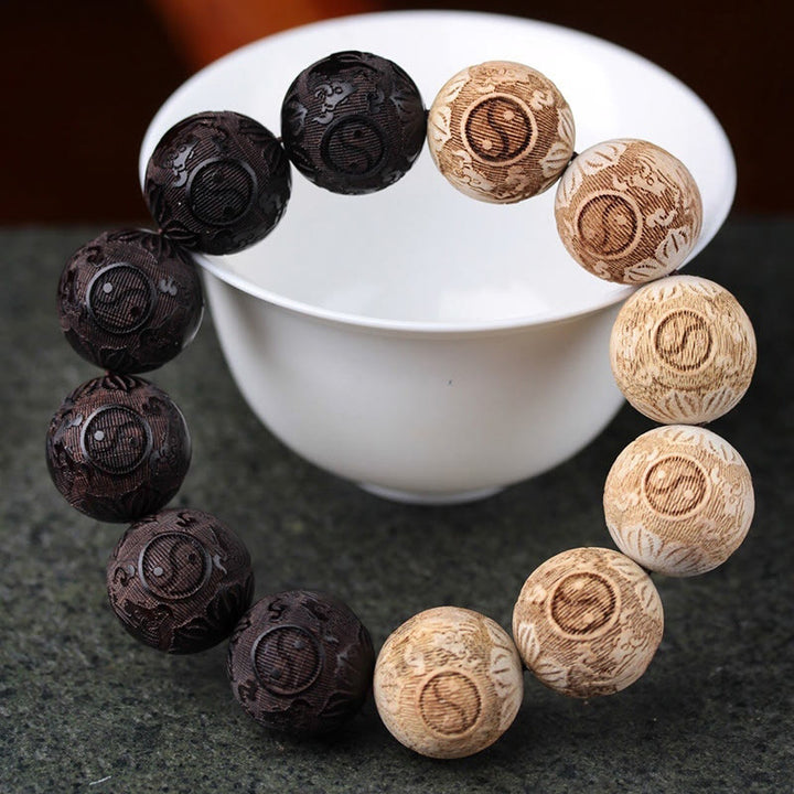 Bracelet de paix gravé en bois d'ébène et bois de camphre avec Buddha Stones et bœuf Yin Yang - Bois d'ébène (tour de poignet 14-17 cm) - image 1