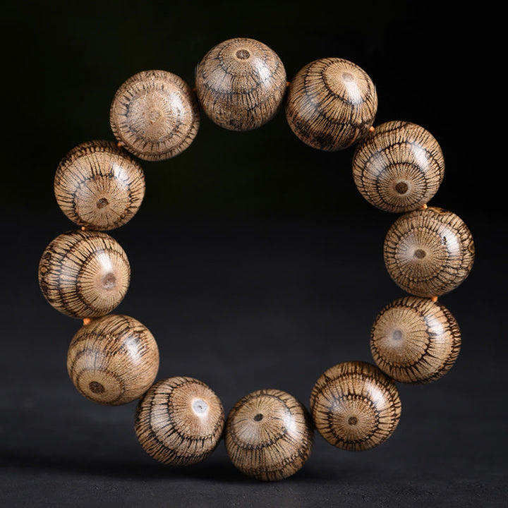 Bracelet de protection en perles de bois de Gnetum et pierres de Buddha Stones - 20 mm (circonférence du poignet 14-17 cm) - image 1